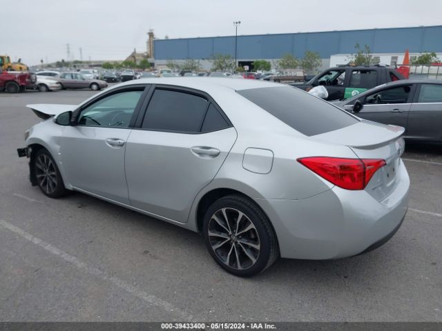 Photo 2 VIN: 5YFBURHE2KP875400 - TOYOTA COROLLA 