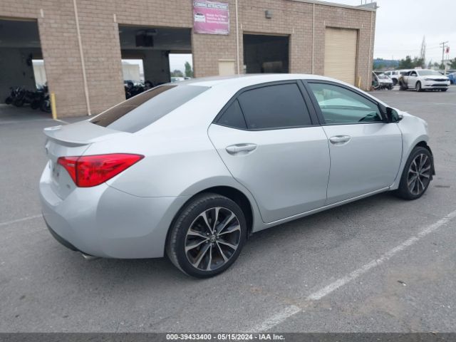 Photo 3 VIN: 5YFBURHE2KP875400 - TOYOTA COROLLA 