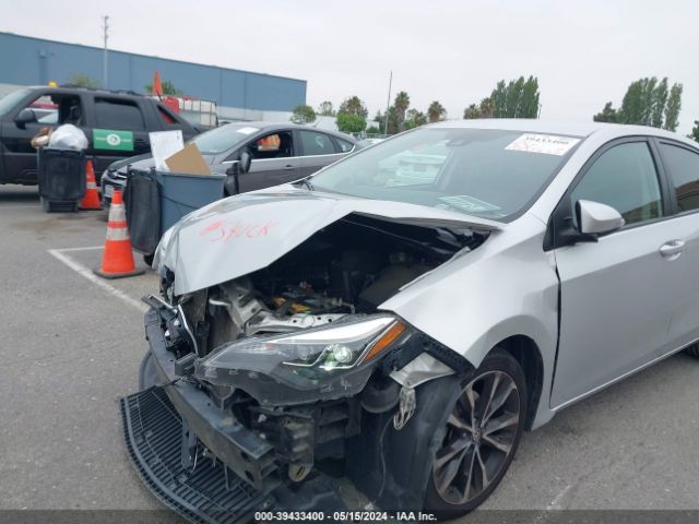 Photo 5 VIN: 5YFBURHE2KP875400 - TOYOTA COROLLA 