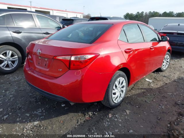 Photo 3 VIN: 5YFBURHE2KP875557 - TOYOTA COROLLA 