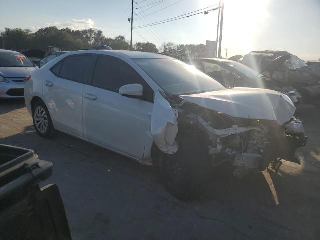 Photo 3 VIN: 5YFBURHE2KP878460 - TOYOTA COROLLA L 