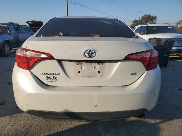 Photo 5 VIN: 5YFBURHE2KP878460 - TOYOTA COROLLA L 