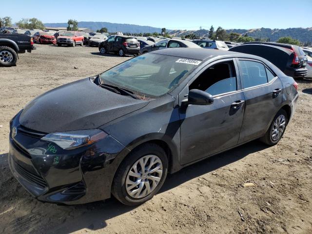 Photo 0 VIN: 5YFBURHE2KP881293 - TOYOTA COROLLA L 