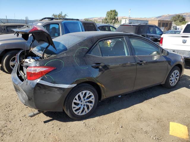 Photo 2 VIN: 5YFBURHE2KP881293 - TOYOTA COROLLA L 