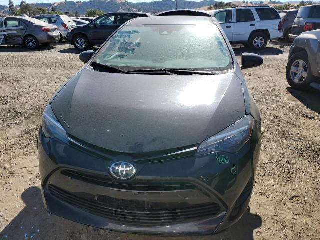 Photo 4 VIN: 5YFBURHE2KP881293 - TOYOTA COROLLA L 