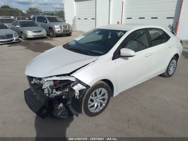 Photo 1 VIN: 5YFBURHE2KP881598 - TOYOTA COROLLA 