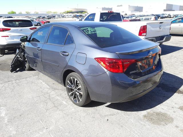 Photo 2 VIN: 5YFBURHE2KP882427 - TOYOTA COROLLA L 