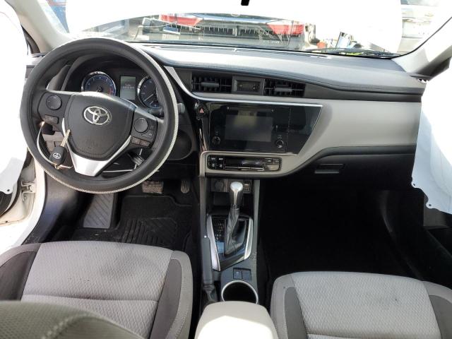 Photo 7 VIN: 5YFBURHE2KP885716 - TOYOTA COROLLA L 