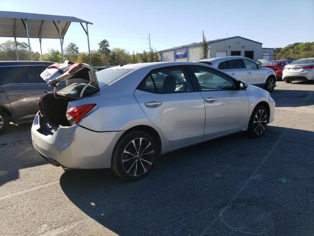 Photo 2 VIN: 5YFBURHE2KP886963 - TOYOTA COROLLA L 