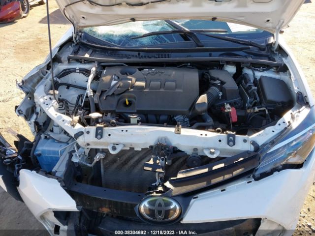 Photo 9 VIN: 5YFBURHE2KP888714 - TOYOTA COROLLA 