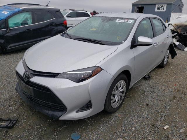 Photo 1 VIN: 5YFBURHE2KP889233 - TOYOTA COROLLA L 