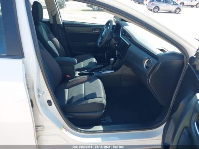 Photo 4 VIN: 5YFBURHE2KP891113 - TOYOTA COROLLA 