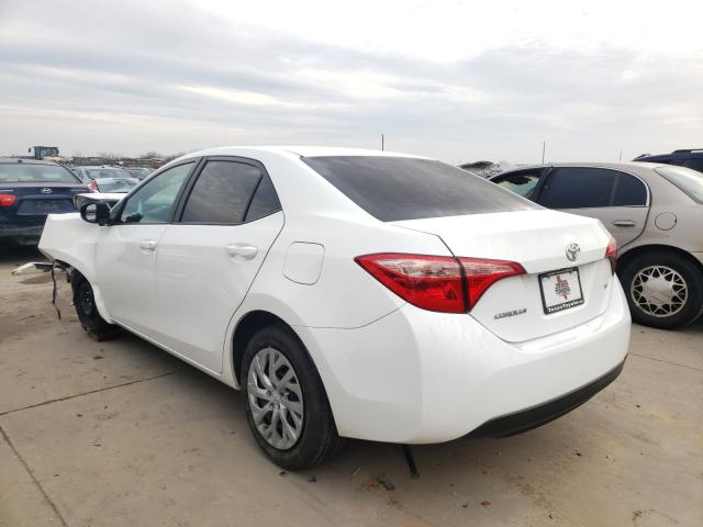 Photo 2 VIN: 5YFBURHE2KP891399 - TOYOTA COROLLA L 