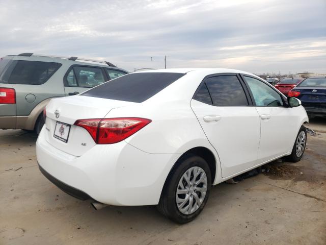 Photo 3 VIN: 5YFBURHE2KP891399 - TOYOTA COROLLA L 