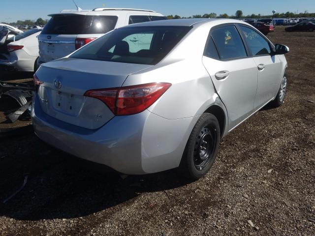 Photo 3 VIN: 5YFBURHE2KP895985 - TOYOTA COROLLA L 