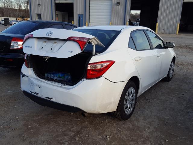 Photo 3 VIN: 5YFBURHE2KP896859 - TOYOTA COROLLA L 