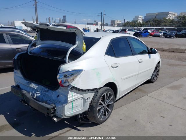 Photo 3 VIN: 5YFBURHE2KP899034 - TOYOTA COROLLA 