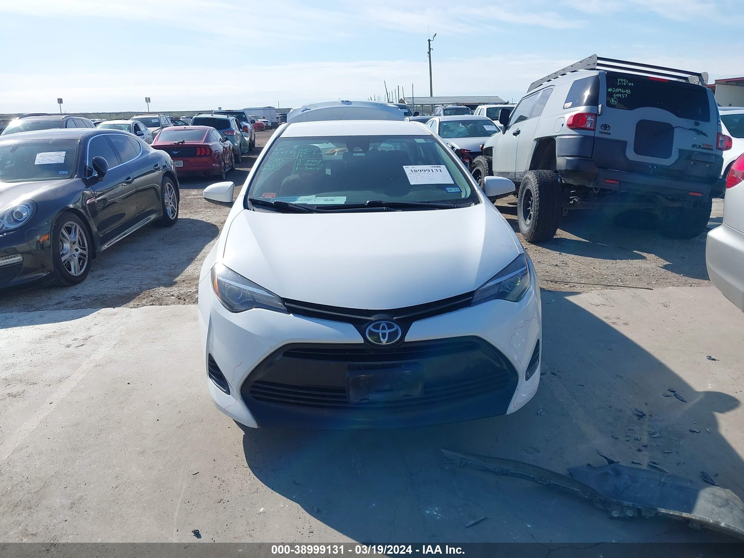 Photo 12 VIN: 5YFBURHE2KP899244 - TOYOTA COROLLA 