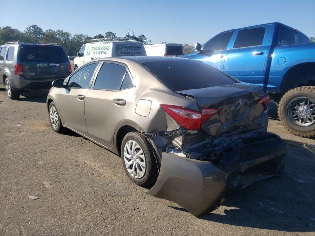 Photo 2 VIN: 5YFBURHE2KP899552 - TOYOTA COROLLA L 