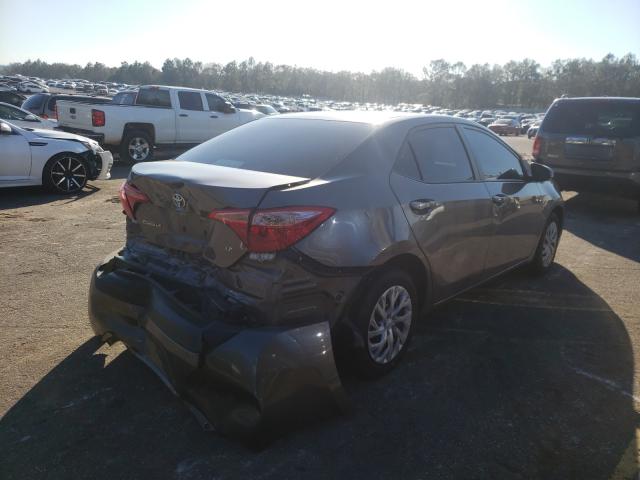 Photo 3 VIN: 5YFBURHE2KP899552 - TOYOTA COROLLA L 