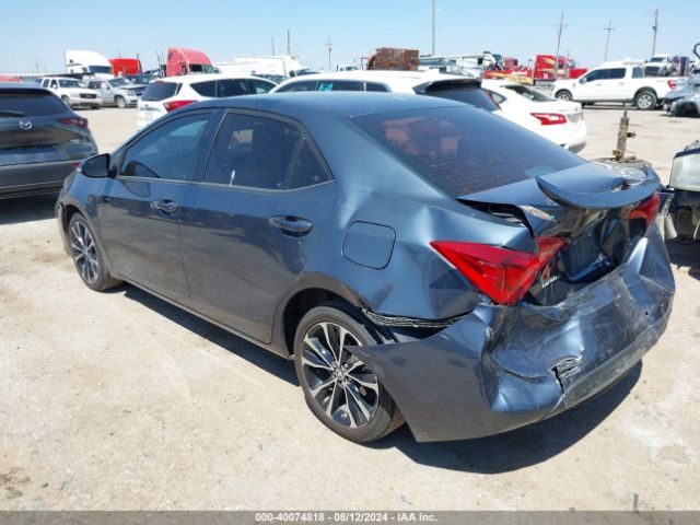 Photo 2 VIN: 5YFBURHE2KP910307 - TOYOTA COROLLA 