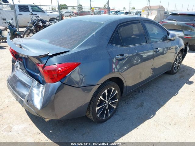 Photo 3 VIN: 5YFBURHE2KP910307 - TOYOTA COROLLA 