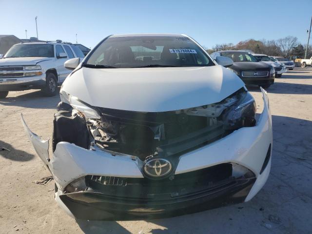 Photo 4 VIN: 5YFBURHE2KP911019 - TOYOTA COROLLA L 