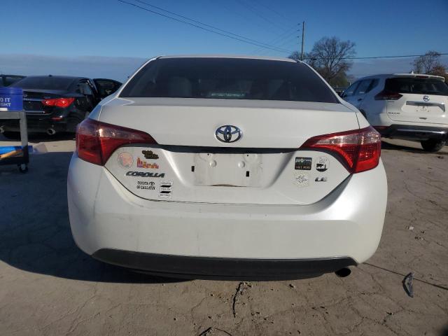 Photo 5 VIN: 5YFBURHE2KP911019 - TOYOTA COROLLA L 