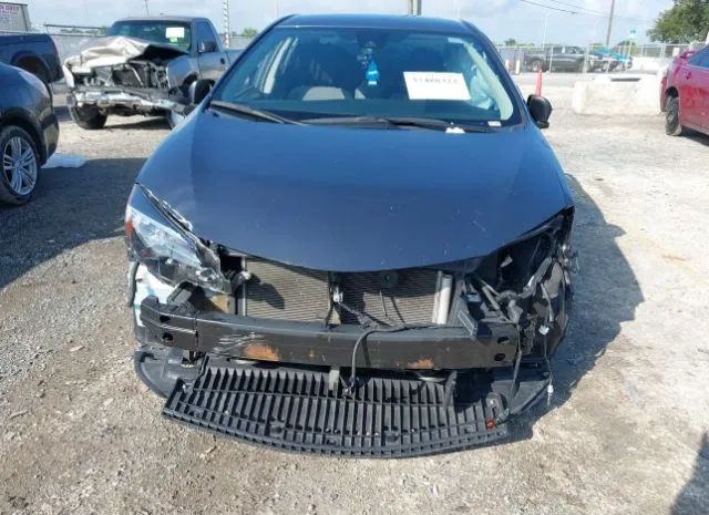 Photo 5 VIN: 5YFBURHE2KP933148 - TOYOTA COROLLA 