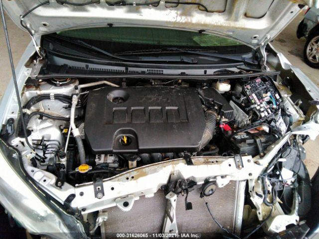 Photo 9 VIN: 5YFBURHE3EP051104 - TOYOTA COROLLA 