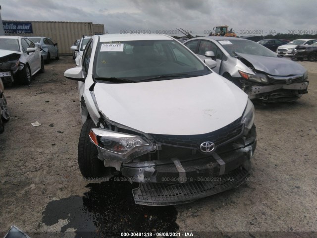 Photo 5 VIN: 5YFBURHE3EP078500 - TOYOTA COROLLA 