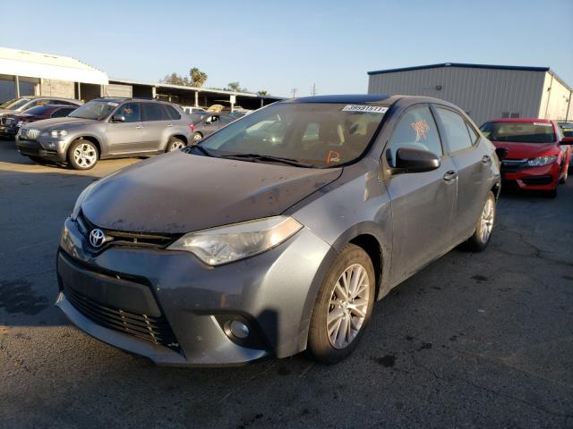 Photo 1 VIN: 5YFBURHE3EP084958 - TOYOTA COROLLA L 