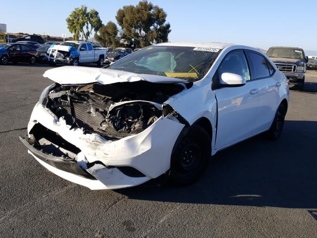 Photo 1 VIN: 5YFBURHE3EP086855 - TOYOTA COROLLA L 