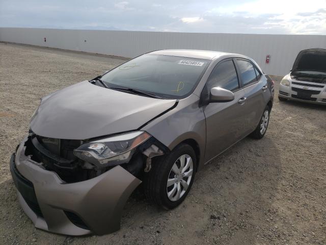 Photo 1 VIN: 5YFBURHE3EP105503 - TOYOTA COROLLA L 