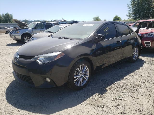 Photo 1 VIN: 5YFBURHE3EP161621 - TOYOTA COROLLA L 