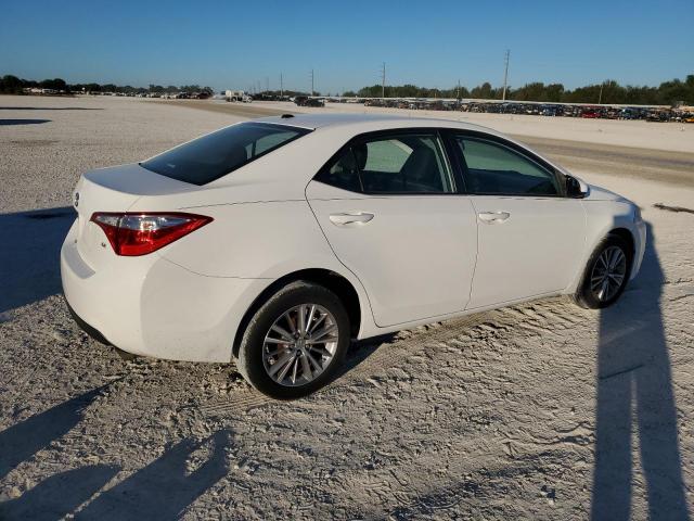 Photo 2 VIN: 5YFBURHE3FP309591 - TOYOTA COROLLA L 