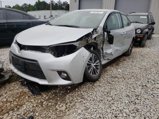 Photo 1 VIN: 5YFBURHE3GP386236 - TOYOTA COROLLA L 