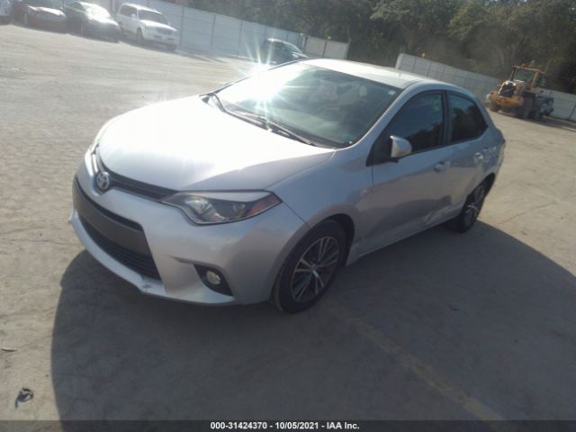 Photo 1 VIN: 5YFBURHE3GP394059 - TOYOTA COROLLA 