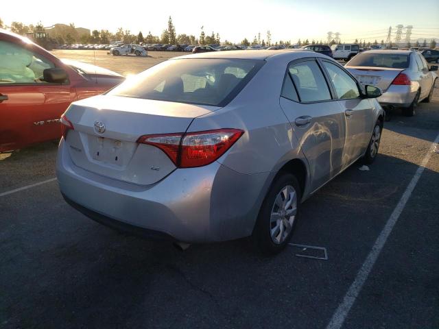 Photo 3 VIN: 5YFBURHE3GP506942 - TOYOTA COROLLA L 