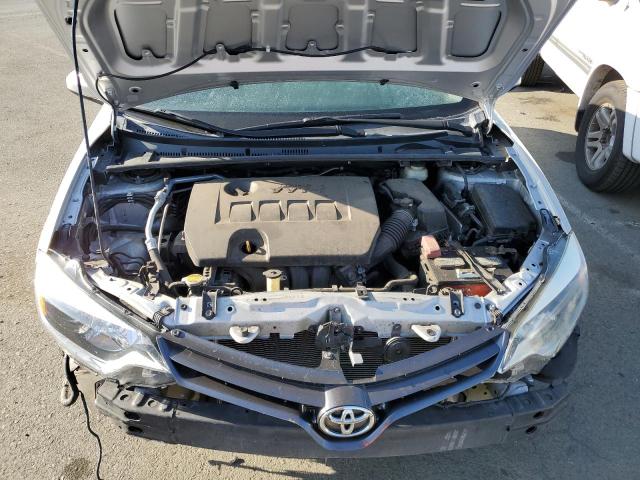 Photo 10 VIN: 5YFBURHE3GP521425 - TOYOTA COROLLA L 