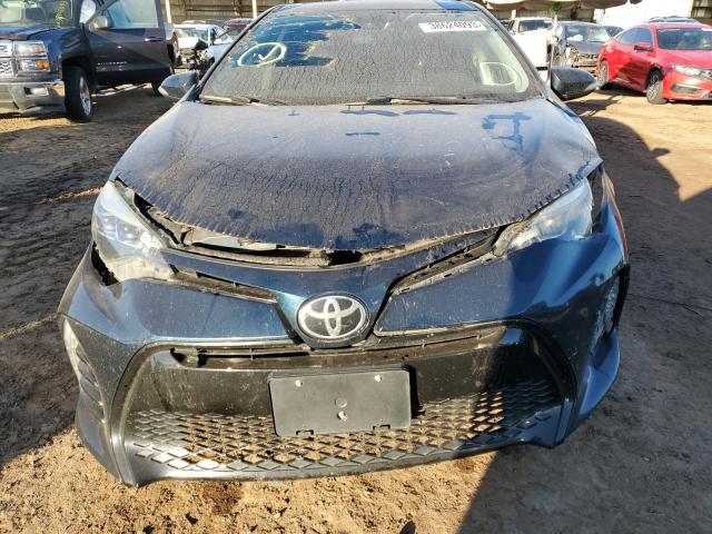 Photo 4 VIN: 5YFBURHE3HP593629 - TOYOTA COROLLA SE 