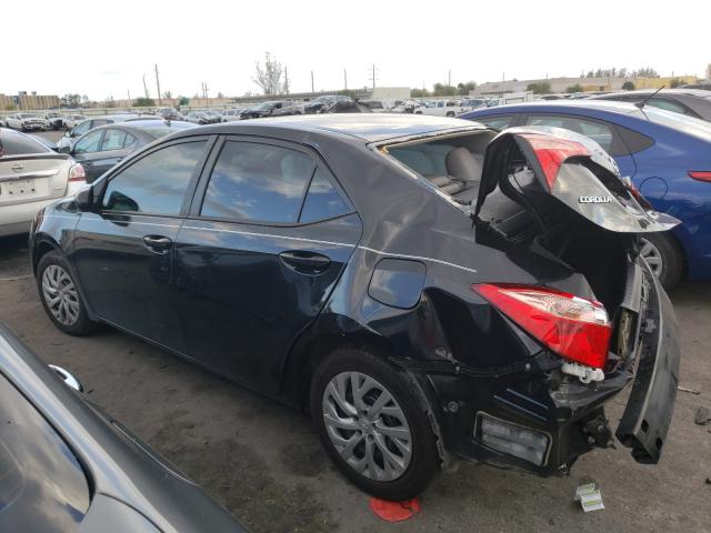 Photo 2 VIN: 5YFBURHE3HP607142 - TOYOTA COROLLA L 