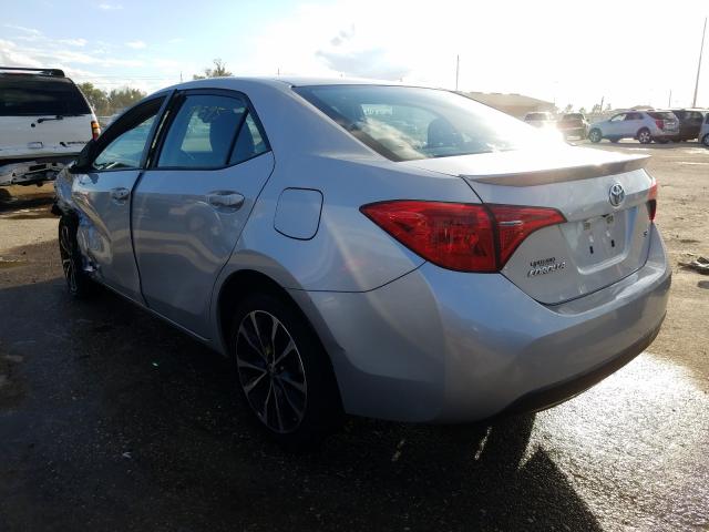 Photo 2 VIN: 5YFBURHE3HP615094 - TOYOTA COROLLA L 