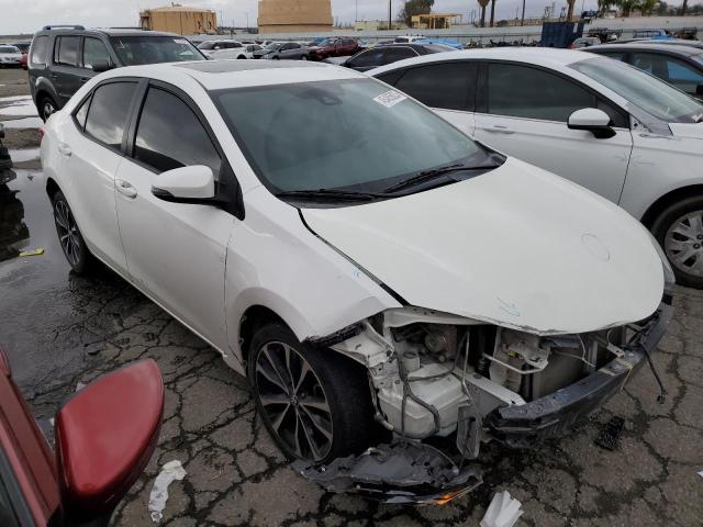 Photo 3 VIN: 5YFBURHE3HP623373 - TOYOTA COROLLA L 