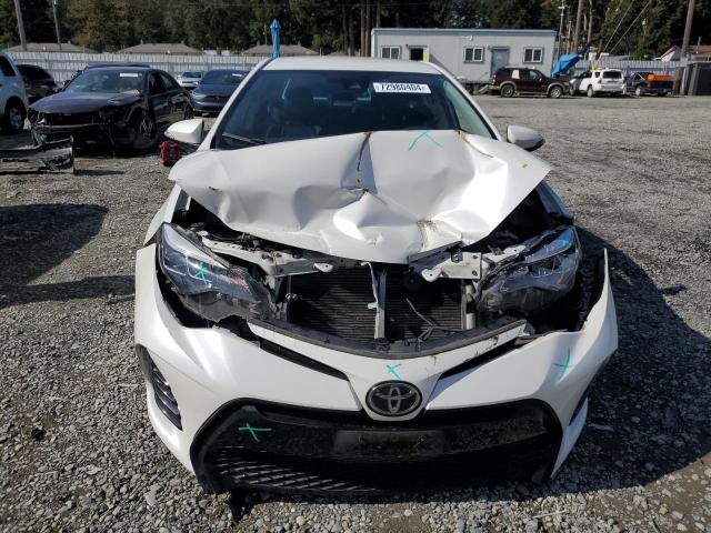 Photo 4 VIN: 5YFBURHE3HP667986 - TOYOTA COROLLA L 