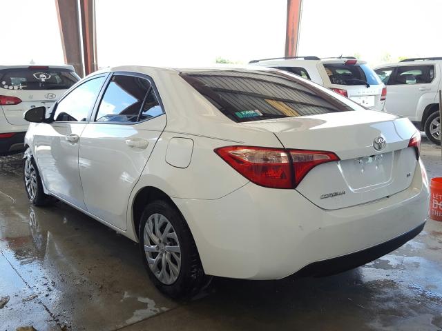 Photo 2 VIN: 5YFBURHE3HP670418 - TOYOTA COROLLA L 