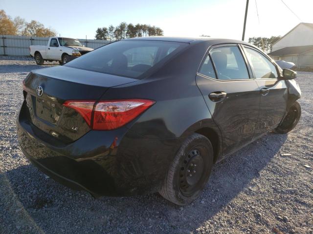 Photo 3 VIN: 5YFBURHE3HP671875 - TOYOTA COROLLA L 