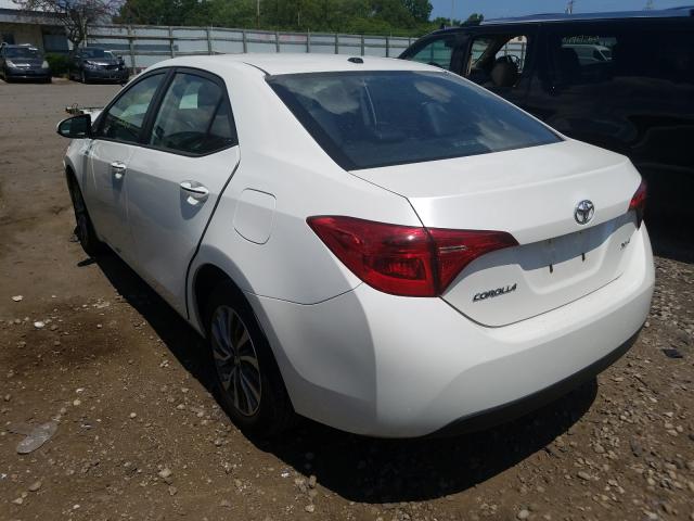 Photo 2 VIN: 5YFBURHE3HP693343 - TOYOTA COROLLA L 