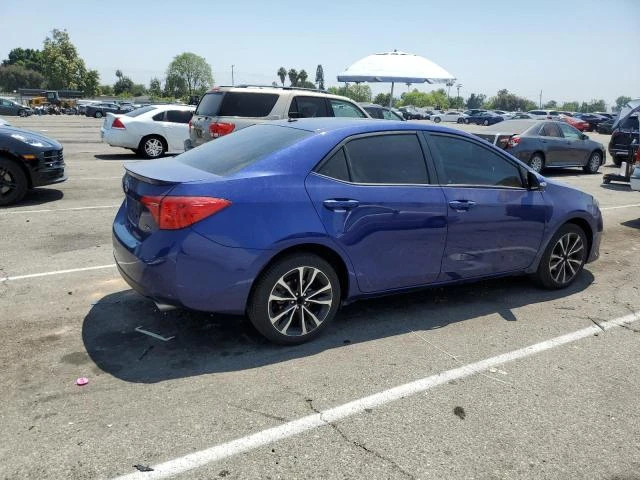 Photo 2 VIN: 5YFBURHE3HP696159 - TOYOTA COROLLA L 