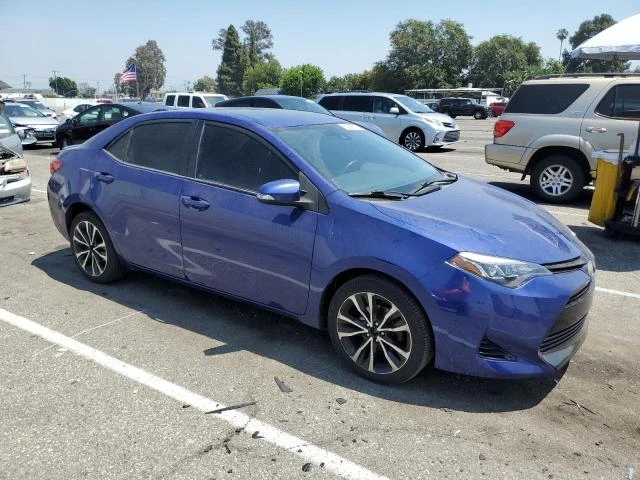 Photo 3 VIN: 5YFBURHE3HP696159 - TOYOTA COROLLA L 